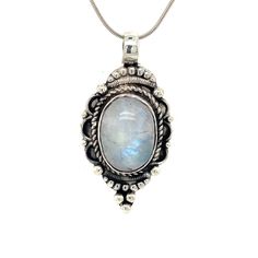 "Vintage Sterling Silver Moonstone Pendant- This silver moonstone pendant has a lot of great detail surrounding the rainbow oval shaped beauty. The piece has lots of granulation and roping to create a boho look. The pendant could be put on a little heavier chain if desired, and it would look great layered with other pieces. Ancient cultures coveted moonstone and created origins for the stone as spectacular as the stone itself. Many believed the stone was created from moonbeams. Others strongly a Bohemian Moonstone Cabochon Jewelry, Bohemian Jewelry With Large Moonstone, Bohemian Moonstone Jewelry With Large Stone, Bohemian Oval Cabochon Moonstone Ring, Silver Bohemian Moonstone Cabochon Ring, Silver Cabochon Moonstone Ring In Bohemian Style, Bohemian Moonstone Teardrop Pendant Jewelry, Bohemian Sterling Silver Oval Cabochon Moonstone Ring, Bohemian Moonstone Teardrop Pendant Necklace