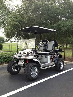 a golf cart parked in a parking lot