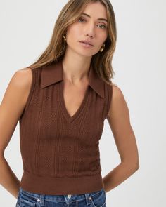 In a luxurious Eco Peachskin fabrication, this retro brown sweater tank is designed with a collared v-neckline and herringbone pointelle stitch detailing throughout. Part of our Eco-Evolution collection, the Rossana Sweater Tank was made from recycled materials to reduce our environmental impact and minimize waste. The goal of our sustainable efforts is to constantly evolve for the better. We are working hard to source environmentally responsible materials that don’t compromise our exceptional q Ivory Sweater, Men Store, Outerwear Vest, Denim Shoes, Sweater Tank Top, Sweater Tank, Working Hard, Brown Sweater, Environmental Impact