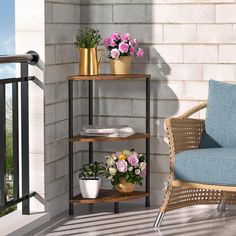 three tiered shelving unit with potted flowers