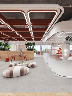 the interior of an office building with modern furniture