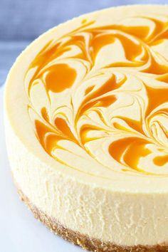 a cheesecake with caramel swirl on top