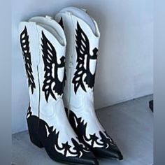 Black And White Cowboy Boots Perfect For Rodeo Western Style Wide Calf Mid-calf Boots In Black, Western Style Black Wide Calf Mid-calf Boots, Black Pointed Toe Heeled Boots For Rodeo, Black Western Mid-calf Boots With Wide Calf, Casual Black Heeled Boots With Snip Toe, Western Style Black Mid-calf Boots With Wide Calf, Black Wide Calf Snip Toe Boots, Black Knee-high Heeled Boots For Rodeo, Black Western Style Mid-calf Boots