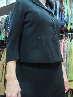 "Original 50s black skir suit. Made in Italy for \"L. Chiussi & Son-Udie\" (pic.5). Combed wool. Four button jacket with two small pockets (pic.1). 3/4 sleeves (pic.2). Pencil skirt. Mint conditions. It fits size M about 8-10 US Size 40-42 EU Measurements of jacket: (lay flat and double chest) Shoulders 15,7\" chest 40\" sleeve length 19,2\" total length 22,4\" Skirt: (double waist and hips) Waist 29,9\" hips 41,3\" length 27,5\" Straordinario tailleur nero anni 50. Lana pettinata di ottima Green Wool, Wool Skirts, Jacket Buttons, Skirt Suit, Dress Suits, Black Wool, Flare Pants, Peplum Dress, Pencil Skirt