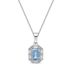 This lovely gemstone necklace is just her sparkling style. The octagon-shaped pendant showcases an emerald-cut Swiss blue topaz wrapped in a frame of white lab-created sapphires in round and baguette cuts. Created in sterling silver, this pendant suspends along an 18-inch box chain that secures with a spring ring clasp. Silver Jewelry With Baguette Diamonds In Rectangular Shape, Rectangular Diamond Gemstone Necklace, Octagon Baguette Diamond Jewelry Gift, Elegant Octagon Birthstone Necklace, Blue Brilliant Cut Sterling Silver Necklaces, Blue Emerald Cut Gemstone Necklace, Blue Brilliant Cut Sterling Silver Necklace, Blue Birthstone Necklace With Rectangular Pendant, Blue Rectangular Pendant Birthstone Jewelry