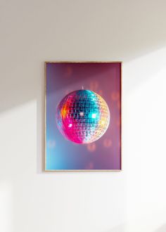 a mirror ball hanging on the wall