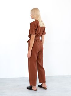 "AURORA is a short sleeve jumpsuit with belt. DETAILS - Wrap style top - Dolman sleeves - Self tie belt - 100% lightweight European linen fabric - Cut and sewn to order just for you in our studio COLOR - Rust, you can also choose other colors above - Fabric samples are available here https://www.etsy.com/listing/586569696/linen-fabric-samples SIZING & FIT - Fits true to size - Inseam is approximately 28.5 inches / 72 cm - Bust is approximately 21 inches / 49.5 cm - Waist is approximately 18. Chic Jumpsuits And Rompers With Belt For Workwear, Workwear Jumpsuits And Rompers With Belt Loops, Belted Short Sleeve Jumpsuits And Rompers For Work, Short Sleeve Belted Jumpsuits And Rompers For Work, Belted Short Sleeve Jumpsuits For Work, Short Sleeve Jumpsuits And Rompers For Workwear, Workwear Jumpsuits With Short Sleeves And Belt Loops, Summer Workwear Jumpsuits And Rompers With Belt, Summer Workwear Belted Jumpsuits And Rompers