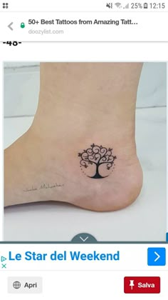 the foot has a tree tattoo on it