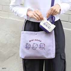 PRODUCT DETAILS CROSS BAG -Material: Cotton, Polyester - Size: 280 x 210 x 55mm MINI POUCH - Material: Cotton, Polyester - Size: 115 x 70 x 35mm ECO BAG - Material: Cotton - Size (excluding strap length): 350 x 380mm Cute Shoulder Bag With Zipper Pouch For Everyday, Casual Portable Bag For Personal Use, Daily Use Purple Shoulder Bag, Cute Purple Zipper Pouch Bag, Purple Shoulder Bag With Removable Pouch For School, Cute Rectangular Shoulder Bag, Purple Rectangular Bag With Pockets, Purple Mobile Phone Bag For School, Cute Purple Bag With Zipper Pouch