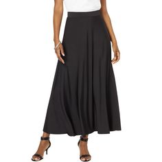 Easy from waist to hem with a flowing silhouette. Elasticized waistband. Black Stretch A-line Bottoms, Formal Black Skirt With Elastic Waistband, Elegant A-line Bottoms With Elastic Waistband, Elegant Flowy Maxi Skirt With Wide Hem, A-line Elastane Lined Skirt, A-line Bottoms With Wide Waistband And Flowy Skirt, A-line Bottoms With Elastic Waistband In Black, A-line Black Bottoms With Elastic Waistband, Elegant Bottoms With Lined Skirt And Wide Hem