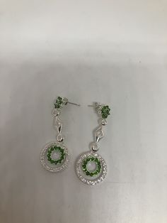 Vintage Chandelier earrings Main stone Chrome Diopside and white sapphire Lovely handmade silver work 92.5% Sterling Silver All jewelry is shipped in a nice gift box. Check out our over a THOUSAND great reviews Green Round Crystal Earrings For Formal Occasions, Cubic Zirconia Round Chandelier Earrings Gift, Gift Cubic Zirconia Chandelier Earrings, Green Cubic Zirconia Chandelier Dangle Earrings, Green Cubic Zirconia Dangle Chandelier Earrings, Diamond White Chandelier Earrings As Gift, Green Cubic Zirconia Diamond Drop Earrings, Green Cubic Zirconia Round Earrings, Green Diamond Earrings As Gift