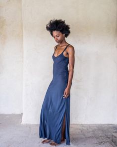 The IDIS Long slip dress is made from a light weight woven rayon. Designed with a scoop neck line and double strapes that drape nicely down the back, side splits to just below the knee and cut on the bias. These features create a dress that moves with you. Bringing you comfort and movability while maintaining a simple elegance. Our long slip looks great teamed with the Kimono Crop from the idis range for a layered effect.SIZE GUIDE XS: bust 76-82 cm | waist 64-70 cm | hips 78-84 cmS: bust 82-84 Slip Dress Long, Summer Dress Beach, Boho Summer Dress, Yoga Pants Men, Beach Dress Summer, Long Slip Dress, Festival Pants, Long Slip, Dress Slip