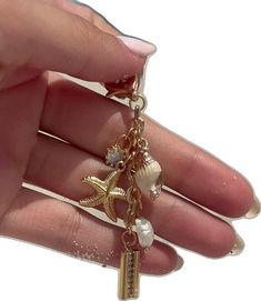 Beachy Gold Jewelry With Starfish Charm, Gold Jewelry With Star Charm For Vacation, Gold Star Charm Jewelry For Vacation, Beach Dangle Charms Jewelry, Charm Jewelry For Beach, Gold Jewelry With Starfish Charm For Beach, Gold Beach Jewelry With Starfish Charm, Gold Starfish Charm Jewelry For Beach, Beach Charms Jewelry