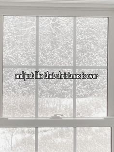 a window with the words and just like that christmas is over