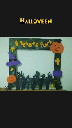 a photo frame with halloween decorations on it