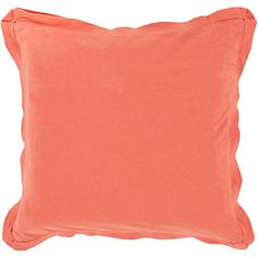 an orange pillow on a white background