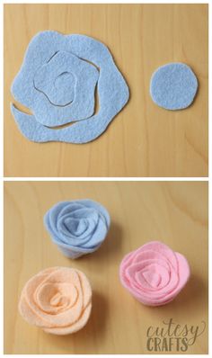 three different types of felt flowers sitting on top of a wooden table