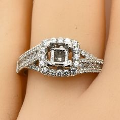 an engagement ring with diamonds on it