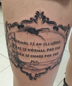 a woman's thigh with a quote on it that reads normal is an illusion what is normal for the spider is chaos for the fly