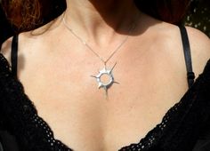 "The mysteries of our solar system always get our imagination aroused. Watching a solar eclipse gives us this feeling of us being part of a great universe. When the moon blocks the sun it is a rare, fascinating, magical moment. I love to carry this moment around with me ----Details---- A solar eclipse pendant from solid sterling silver hand carved using the lost wax method. hole diameter: 11mm 0,43inch comes on a 18 inch/ 45cm long black sterling silver chain.If you would like a 20 inch / 50cm l Sterling Silver Sun Design Jewelry, Sterling Silver Jewelry With Sun Design, Unique Sterling Silver Sun And Moon Jewelry, Eclipse Jewelry, Eclipse Necklace, Eclipse 2024, Anniversary Necklace, Necklace Star, Diy Jewelry Inspiration