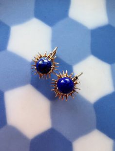 "For sale a beautiful pair of 14k gold earrings featuring two Lapis Lazulis cabochons. We love the earrings for its deep celestial blue color together with the golden glimmer from the yellow gold mounting. The earrings are hallmarked for 14K gold and they have the lever-back closing system for pierced ears. With its deep celestial blue, lapis lazuli has been used as a charm to ward off the powers of darkness. Its name is derived from the Latin for \"blue stone\"--has long been treasured as a gem material as well as for its other uses. Ancient Egyptians ground it into a powder for use in cosmetics. Medieval builders used it in mosaics to adorn their cathedrals. Renaissance painters coveted lapis as an ingredient for making \"ultramarine\" blue, an expensive pigment of unrivalled brightness Fine Jewelry 14k Gold Filled Round Earrings, 14k Gold Filled Round Fine Jewelry Earrings, 14k Gold Huggie Earrings Gift, Fine Jewelry Huggie Gift, Fine Jewelry 14k Gold Hoop Earrings For Gift, Fine Jewelry 14k Gold Hoop Earrings As A Gift, Gift 14k Gold Fine Jewelry Hoop Earrings, Luxury Gemstone Clip-on Earrings For Gift, Fine Jewelry 14k Gold Nickel-free Earrings