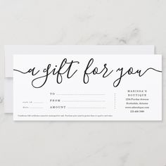 a gift for you card on a marble surface