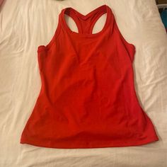 Cutest Lululemon Tank Top That Fits Like Swiftly! Never Worn! Size 8 But Fits Bigger! Cute Red Color Red Stretch Tank Top For Workout, Red Sporty Racerback Top, Red Moisture-wicking Athleisure Tank Top, Sporty Red Racerback Top, Casual Red Activewear For Light Exercise, Red Go-dry Racerback Activewear, Red Racerback Athleisure Tops, Red Racerback Top Athleisure, Red Athleisure Tank Top For Training