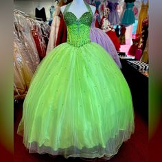 Stunning Lime Green Embellished Glitter Tulle Ball Gown. It's Thick Halter Strap And Sweetheart Bodice Is Fully Adorned With Various Types Of Crystals And Sequins. This Gown Has A Zipper Back Closure. One Piece Available In Lime Size 4. # 26652 Embellished Green Tulle Ball Gown, Green Embellished Tulle Ball Gown, Green Embellished Ball Gown For Party, Green Sequined Ball Gown, Green Embellished Ball Gown For Wedding, Green Tulle Quinceanera Dress For Party, Green Organza Ball Gown, Elegant Green Quinceanera Dress For Evening, Green Embellished Organza Gown