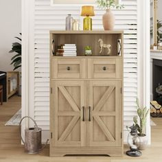 This vertical storage cabinet is designed with 2 doors, 2 drawers, and 1 adjustable shelf which offers neat organization and ample storage space. It can be used as a kitchen pantry, a sideboard, a cupboard, or even a bookcase with doors to organize your books. This storage cabinet is crafted from durable, recyclable P2 board that offers robustness and longevity.Natural Color: Off-White. Vertical Storage Cabinet, Farmhouse Storage Cabinets, Bookcase With Doors, Kitchen Pantry Cabinet, Drawers And Shelves, Cabinet With Drawers, Food Pantry Organizing, Storage Cabinet With Drawers, Wooden Storage Cabinet