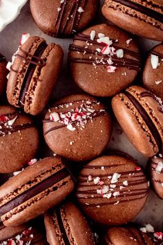 chocolate covered cookies with white and red sprinkles