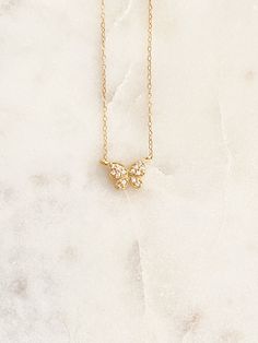 gifts for her, Butterfly necklace, Necklaces for women, Tiny Gold Necklace, Dainty Gold Necklace, Gold necklace, CZ Necklace, Simple Necklace, Minimalist Necklace Bridesmaid Gift diamond ♥This necklace is so dainty & feminine. This beauty adds just the right amount of sparkle & is perfect for layering with your initial or bar necklaces or simply worn alone. ♥A delicate gold filled chain, with a hint of shimmer. Adorned with a dainty gold plated butterly cz pendant. Finished with a traditional 14 Tiny Gold Necklace, Gold Necklace Dainty, Bar Necklaces, Diamond Gift, Dainty Gold Necklace, Cz Necklace, Necklace Simple, Cz Pendant, Necklace Minimalist