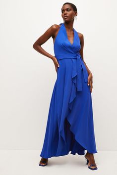 Be Ready For Long Summer Nights In This Draped Maxi Dress. Cascading With Romantic Frills, It Has A Luxe, Languid Vibe Emboldened By The Halter-Neck Straps, Open Back And Knotted Waist Tie. A Statement-Making Option For Vacation Dinners Or Summer Weddings, It Looks Best Work With Strappy Heels And Swept-Back Hair. Belted Floor-length Maxi Dress, Belted Floor-length Maxi Dress For Party, Evening Belted Maxi Dress, Blue Belted Maxi Dress For Party, Elegant Belted Maxi Dress For Cocktail, Elegant Belted Cocktail Maxi Dress, Chic Belted Floor-length Maxi Dress, Evening Maxi Dress With Belt, Evening Floor-length Maxi Dress With Tie Waist