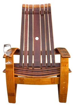 a wooden chair with a wine glass on the back and bottom part sitting in front of it