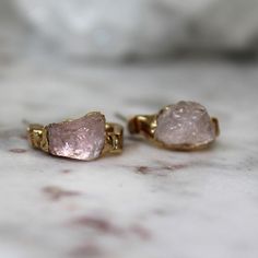 Raw morganite dipped in 18k gold. These earrings measure 1/2" Nature is a strong force flowing through our jewelry. We let the raw gemstones do the talking.  Each unique stone determines the shape and style each design will take on. In return, we achieve an organic and luxe feel. All of our jewelry is one of a kind. ::The process of gold dipping:: Handpicked stones are arranged and set in copper. A generous layer of 18k gold is then applied.  ♥ Thank you for shopping Cocolina ♥ Dainty Rose Quartz Gold Jewelry, Gold Jewelry With Raw Stone, Elegant Raw Jewelry Gift, Elegant Raw Jewelry For Gifts, Everyday Rose Quartz Gemstone Jewelry, Gold Rose Quartz Earrings For Gift, Everyday Gold Jewelry With Raw Stone, Gold Gemstone Jewelry With Rose Quartz, Gold Jewelry With Rose Quartz Gemstone