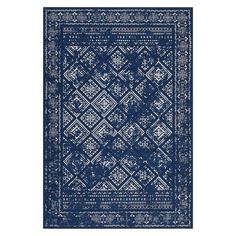 a blue and white rug with an intricate design