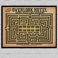 a brick wall with a poster on it that says overlook hotel ridge maze and gardens