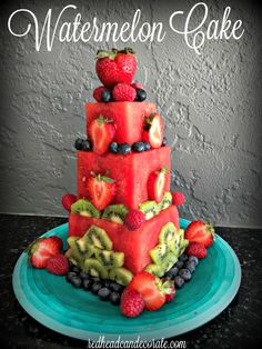 a watermelon cake with fruit on top and the words watermelon cake above it