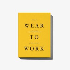 a yellow book with the words wear to work written on it, against a white background