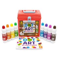 the dot art activity kit is packed with markers and paint bottles for kids to use