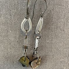 Wireworked earrings with flashing, shining mussel shell pieces. Mussel Shell, Unique Gift Wrapping, Small Boxes, Wearable Art, Drawstring Bag, Jewelry Earrings Dangle, Etsy Earrings, Dangle Drop Earrings, Dangle Earrings