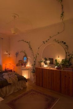 a bed room with a neatly made bed and plants