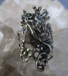 A beautiful Art Nouveau style Princess ring is hand cast in Sterling Silver. Long Flowing Hair, a Crown, and fine details are antiqued to bring out the highlights. The ring is about 1 3/16 inch long at the top and tapers down to a plain shank in the back. It is made in a size 7 1/2. I will wrap the ring in gift box and mail in a small box within 1-2 days of purchase, usually one. First Class postage with tracking is free in the U.S. . Ask about international shipping! Antique Hand Cast Rings For Anniversary, Antique Hand Cast Jewelry For Wedding, Antique Hand Cast Wedding Jewelry, Hand Cast Antique Rings For Anniversary, Antique Sterling Silver Hand Cast Rings, Vintage Hand Cast Rings For Anniversary, Hand Cast Vintage Rings For Anniversary, Vintage Hand-cast Rings For Anniversary, Antique Hand Cast Sterling Silver Rings