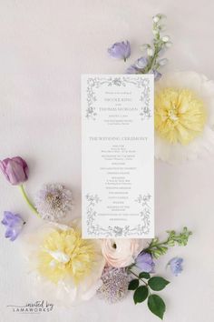 the wedding program is surrounded by flowers and greenery on a white background with purple, yellow and lavender blooms