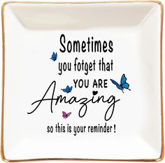 a white plate with some blue butterflies on it and the words sometimes you forget that you are amazing so this is your reminder