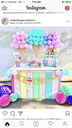 an ice cream stand decorated with balloons and streamers in pastel colors is featured on instagram