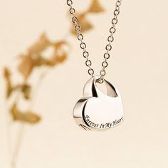 This heart-shaped urn drop necklace is not just a piece of jewelry; it's a precious keepsake that allows you to hold the memories of your loved ones close to your heart. Whether it's a cherished human companion or a beloved pet, this necklace is a touching way to keep their ashes with you, a beautiful remembrance of the love and connection you shared. Key Features: Handmade Craftsmanship: Each heart-shaped urn drop necklace is meticulously handcrafted with care and attention to detail. Our skill Cremation Jewelry Necklaces, Hair Keepsake, Cat Memorial Gift, Ashes Necklace, Memorial Pendant, Urn Pendant, Urn Jewelry, In Memory Of Dad, Urn Necklace