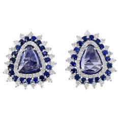 Handcrafted from 18-karat gold, this stud earrings is set with 3.3 carats of sapphire and .83 carats of glimmering diamonds. FOLLOW MEGHNA JEWELS storefront to view the latest collection & exclusive pieces. Meghna Jewels is proudly rated as a Top Seller on 1stDibs with 5 star customer reviews. All items manufactured by us are handmade and can be customized or redesigned. Composition Size-18X16 MM Total Weight-6.08 Gold Weight(Gms)-5.254 Diamond Wt(Cts)-0.83 Blue Sapphire Wt(Cts)-3.3 Gia Certified Sapphire Earrings For Formal Occasions, Gia Certified Sapphire Diamond Earrings For Formal Occasions, Formal Gia Certified Sapphire Diamond Earrings, Sapphire Pear-shaped Earrings Fine Jewelry, Luxury Lab-created Sapphire Earrings For Formal Occasions, Luxury Lab-created Sapphire Earrings For Formal Events, Gia Certified Sapphire Diamond Earrings, Blue Sapphire Diamond Earrings Gia Certified, Formal Brilliant Cut Lab-created Sapphire Earrings