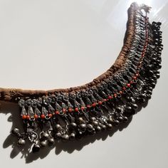 "A beautiful specimen for collector of tribal silver. This style is sometimes known as a labba mazamir and was popular with Jewish women living in Sa'ada. This piece is very old and in the original condition. Nothing has been restrung or replaced, nor has the silver been plated or dipped in a chemical acid bath for cleaning. The pendants exhibit very fine work in the filigrees with none of the shortcuts used in recent years. While you can wear it as a choker, and I've seen photos of this design Traditional Antique Silver Jewelry, Traditional Silver Handmade Choker, Traditional Handmade Silver Choker, Traditional Heavy Silver Necklace, Heavy Silver Bohemian Choker, Traditional Silver Metal Choker, Traditional Silver Pendant Choker, Bohemian Antique Silver Necklace For Ceremonial Occasions, Traditional Metal Necklace For Ceremonial Use