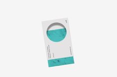 the packaging is designed to look like it has been made from turquoise and white paper