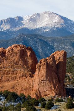 the mountains are covered with snow in the distance, and there is no image here to provide a caption for